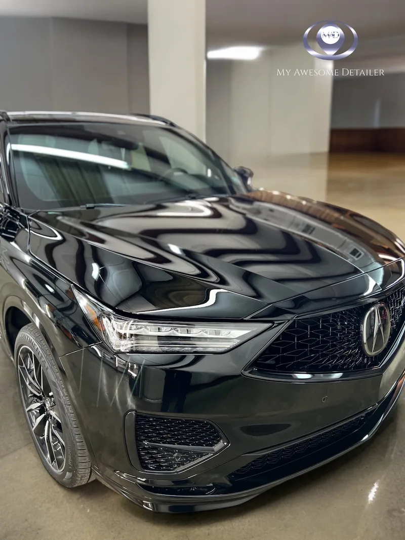 Black Acura MDX with glossy ceramic finish
